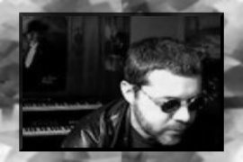 An image of me with keyboards, and the Phantom watching...